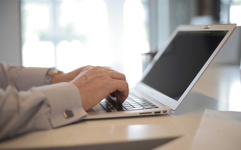 man using laptop